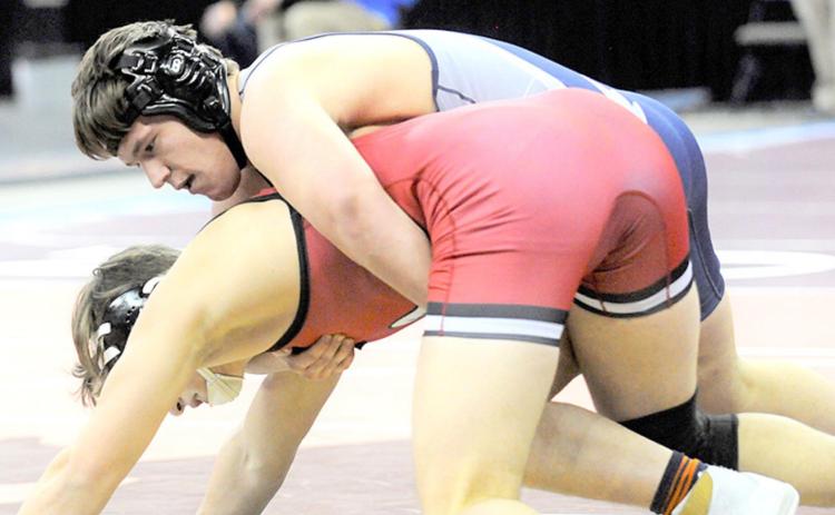 HTRS/P.C.’s Aiden Worthey (on top) takes on one of his competitors in the 195 lb. Division of the Class C State Wrestling Tournament over the weekend. photo courtesy of Luke Nichols/Beatrice Daily Sun