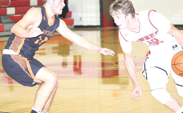 P.C’s Kyle Gyhra (#10, right) takes off down the lane against a Diller/Odell defender. The Indians struggled on offense in their home opener and lost 14-51. Paula Jasa/Republican