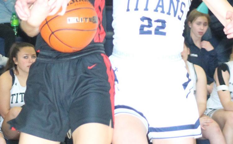 P.C.’s Mallory Branek (left) battles HTRS’ Lillian Bowen (#22, right) for a rebound. Paula Jasa/Republican