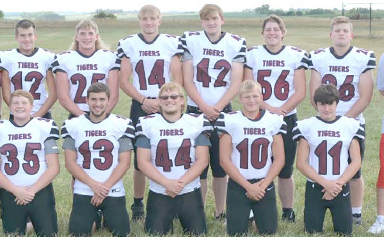 Members of the 2022 Lewiston football team are front, from left: Brody Wright, Brady Bledsaw, Jaxon Janssen, Everett Bohling, Alex Pospichal; Second row: Coach Chuck Humphrey, Assistant Coach Matt Sholty, Ashton Sanders, Tristen Ray, Caleb Rule, Jip Van De Voort, Ty Arena, Dejan Markwort, Assistant Coach Alex Callan, Assistant Coach Eric Bledsaw. Not pictured: Freddie McMurray.