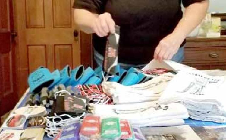 Suz Ellis with some of the packages going out to Table Rock Class of 1970.