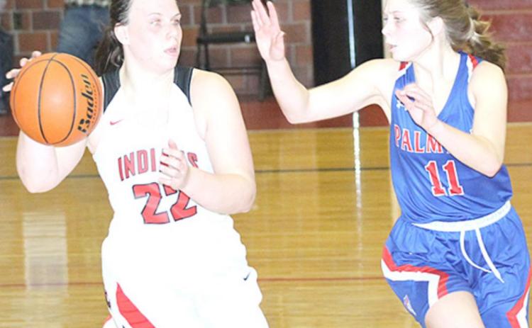 P.C.’s Austin Branch #22, left) brings the ball down the floor against Palmyra in the 3rd place game. Paula Jasa/Republican