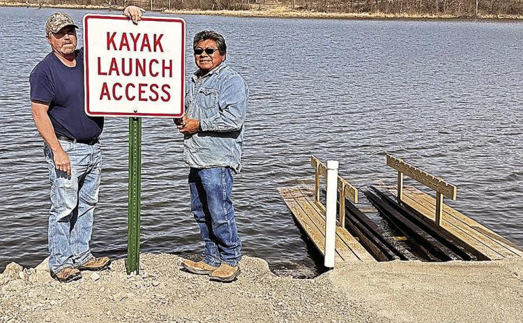 Last week, NRD workers Tomas Chale, Ken Hattun, and Aaron Stalder installed the launch at Iron Horse. On Friday, they returned and Tomas and Ken installed a sign. Photo by Sharla Sitzman
