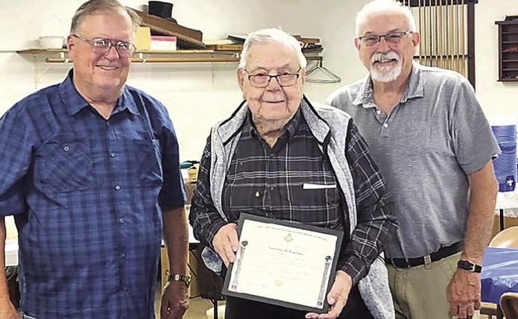 Pictured Above: Larry Bradbury, Lawrence Bradbury and Charlie Hatfield.