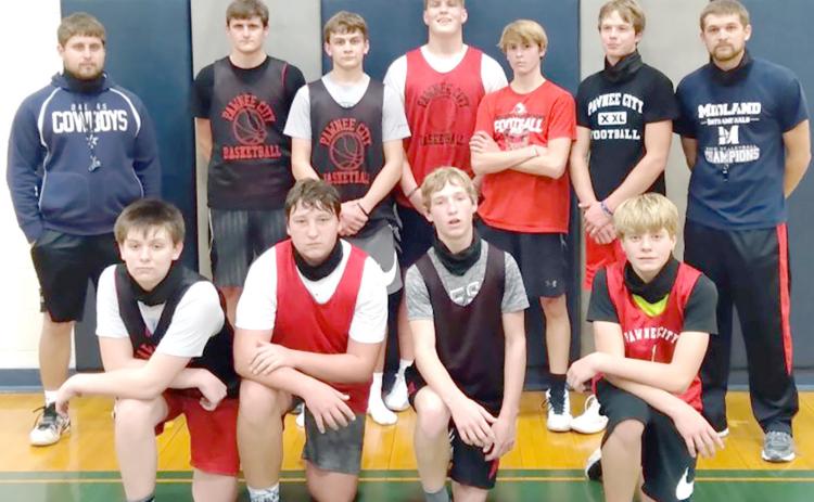 Members of the 2020-21 Pawnee City Boys’ Basketball team are front, from left: Brysen Horst, Joey Marteney, Justin Pierce, Trey Marteney. Back row: Asst. Coach Mason Amundson, Bryce Gyhra, Kaden Lang, Simon Osborne, Kylenn Koester, Kyle Gyhra, Head Coach Hadley Sejkora. Not pictured: Jacob Lytle, Nick Owen-Horner.