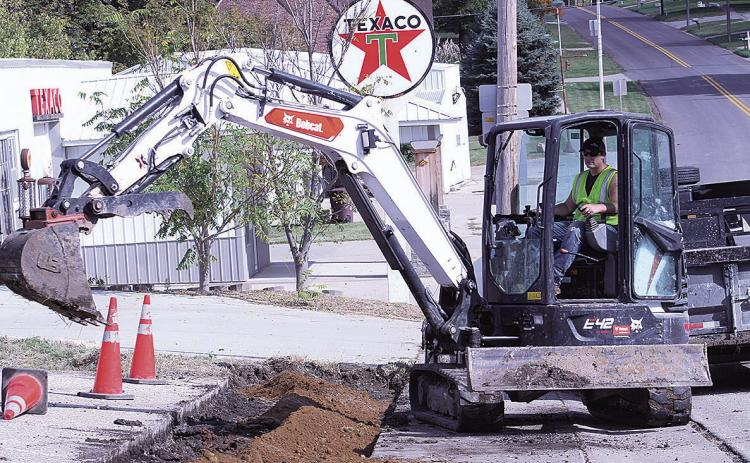 Men At Work: Parking Lot Addition