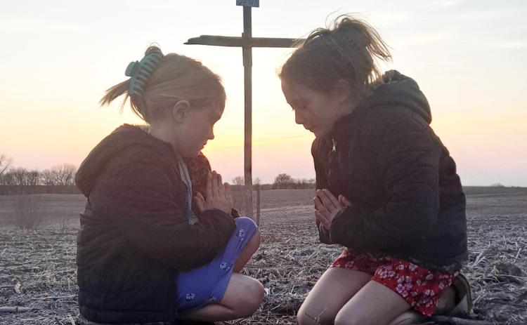 Sutton and Riley Eggers at the Good Friday Services at the Table Rock Cemetery. The girls are the great grandchildren of LARRY and Karen Gilbert. Picture was taken by Courtney Eggers.