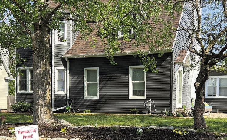 The first home to receive a Pawnee City Proud sign this summer, is the home of Russ and Kate Weeks. The Weeks family has spent hours remodeling their home, putting up a new garage building, and landscaping their yard! It all looks wonderful! Thank you for helping our community look its best!