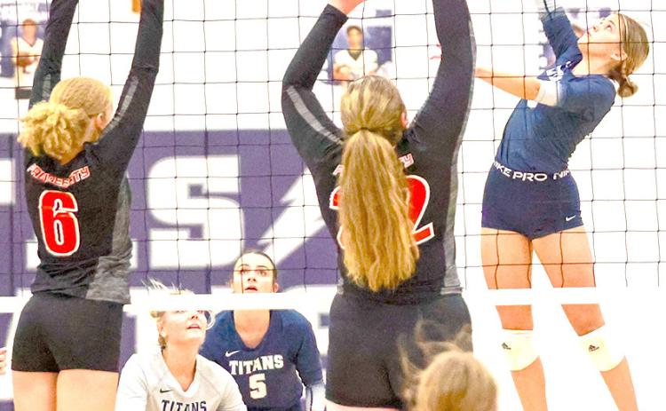 HTRS’ Avery Dierberger (right) goes up for a tip over Pawnee City’s Madelyn Osborne (#6) and Riana McAhon (#22) while P.C.’s Kaylee Turnbull (#3); HTRS’ Jaylie McNealy (#8) and Lillian Bowen (#5) look on. Photo courtesy of Lorrie Novak