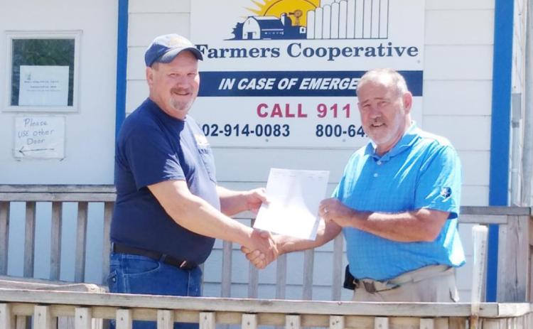 FARMERS COOPERATIVE DONATES TO PAWNEE COUNTY AG SOCIETY
