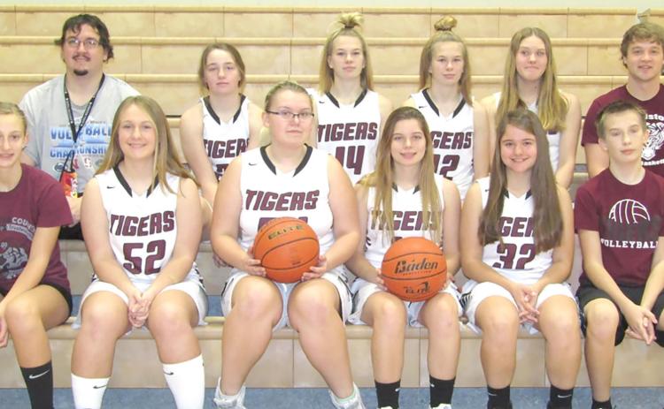 Members of the 2020-21 Lewiston Girls’ Basketball Team are front, from left: Maddie Janssen, SM, Becca deKoning, Jaszmyne Charles, Masyn Arena, Leah Christen, Ashton Sanders, SM. Back Row: Asst. Coach Alex Callan, Carleigh Weyers, Meagan Sanders, Katelyn Sanders, Emma deKoning, Head Coach Schuyler Kuhlmann.