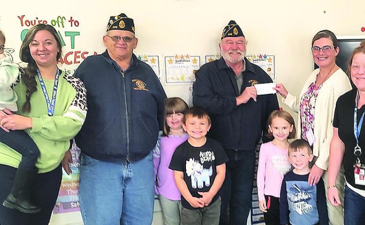 $500 dollar donation from the Table Rock American Legion to the Headstart Program for them to buy toys for the kids. With Jerry Vrtiska and Gregg Clement.