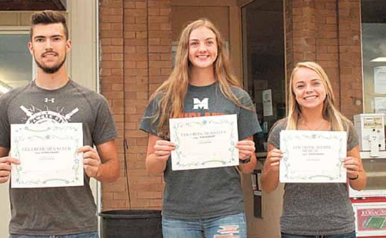 Elk Creek Scholarship recipients were recognized at the Elk Creek BBQ on August 1, In the photo from left to right are Colby Robison, Carrie Beethe and Dana Christen.