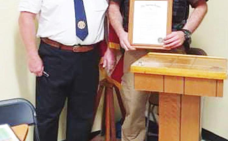 Sheriff Braden Lang received a Certificate of Law Enforcement Commendation from Brown Hays Post 289 presented by Gregg Clement. The award was made at Shirley’s on Veterans Day.