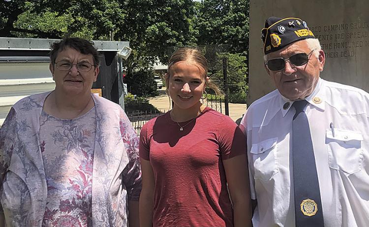 Pictured - Pastor Lori Stevens, Madison Fender, Mike Puhalla. Almost 50 people gathered at the Table Rock Cemetery on Sunday, May 26th to witness the memorial services. Pastor Lori Stevens delivered the sermon. Miss Madison Fender sang God Bless America. American Legion Brown-Hays Post 289 rendered honors. Humbly submitted by: Suzanne Ellis