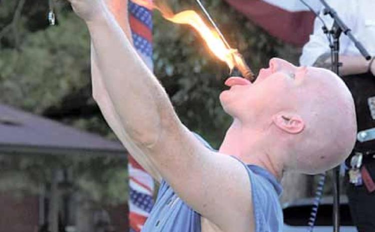 Performers from Drops Unlimited from the Kansas City area, gave a show at the Table Rock Fair Saturday. They used fire and other lighting props like LED to thrill the crowd. Ray Kappel/Republican