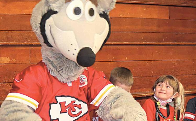 KC Wolf had many adoring fans at his show at Lewiston Consolidated Schools Wednesday. This is Eloise Campbell, Kindergarten, Ray Kappel Photos/Republican