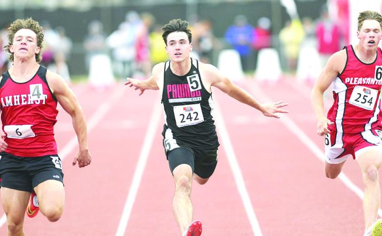 Pawnee City’s Jett Farwell (center) crosses the line quickly in the Class D boys’ 100 M. Dash prelims on Friday. Photo courtesy of Luke Nichols/Beatrice Daily Sun