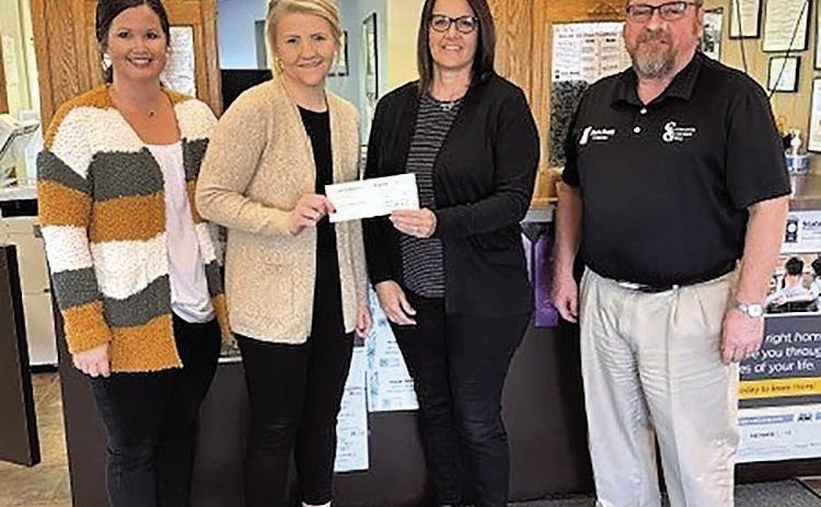 Pictured are: Kelly Shupp and Allison James, Humboldt Improvement Project Committee Members, Vicky McNealy, SENCA Executive Director, and Mark Joy, State Bank of Table Rock/Project Committee Member.