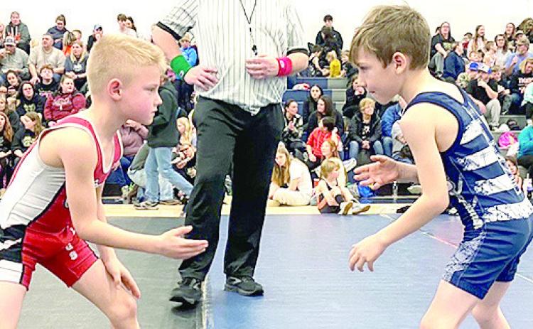 They recently hosted their tournament with 226 wrestlers in attendance. Pictured right is HTRS’ Talon Wamsley (right) in one of his matches. He took 1st place in one of the the 1st2nd grade divisions. See below for all of the details.