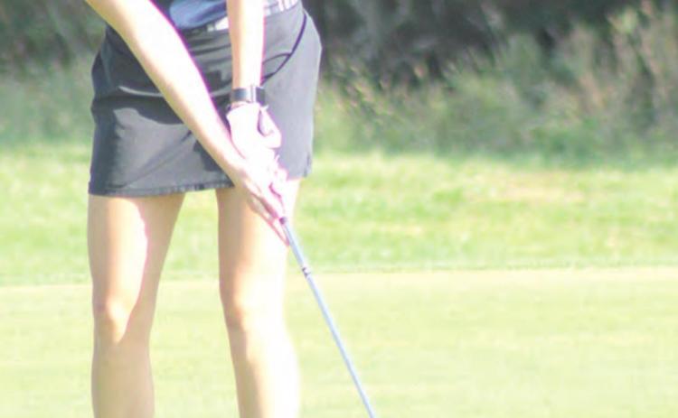 HTRS’ Gracie Shafer watches her putt roll towards the hole at the HTRS Invitational on Monday morning. Paula Jasa/Republican