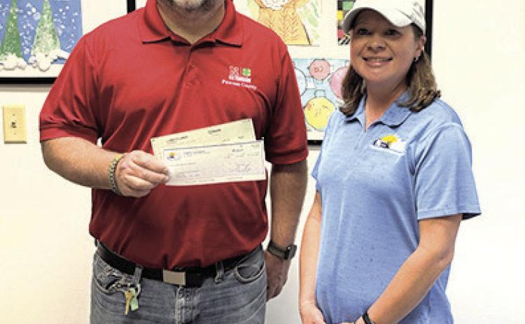Pictured from left to right: Jason Vetrovsky – Pawnee City Schools Board President, Monica Busboom.
