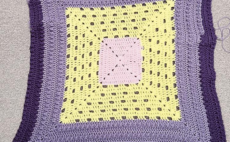 Your blanket should look similar to this by the end of this section. I ran out of one purple and had to switch part way through.