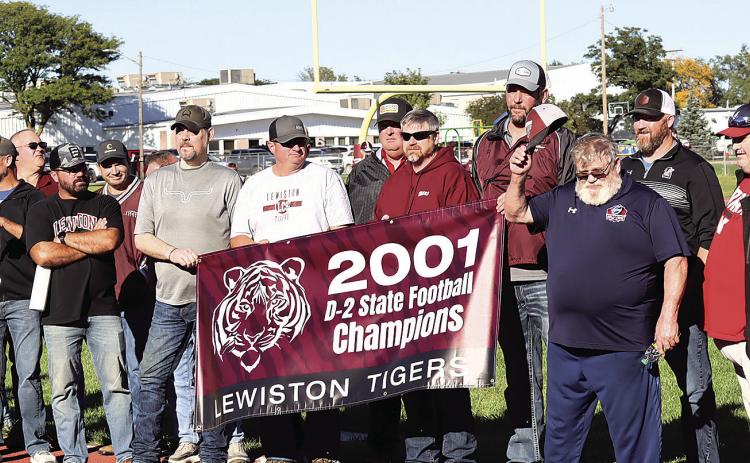 Coach Neil Woofter tipping his cap to the Lewiston fans and everyone who gathered to honor his 8-man Football Hall of Fame celebration. Photo by Paula Jasa former Sports Editor for Pawnee Republican